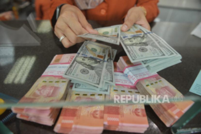 Rupiah Menguat? Intip Arah Kebijakan The Fed di Pasar!